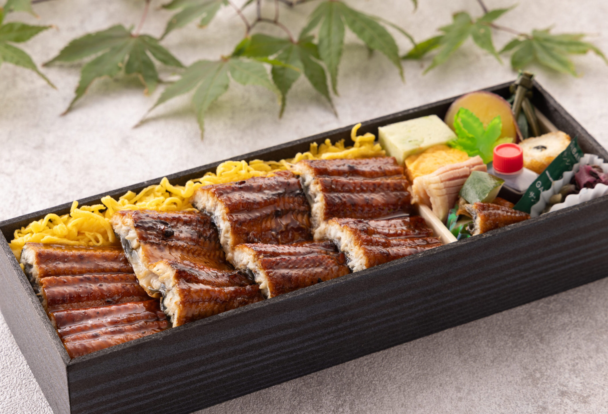 日本料理 雲海『うなぎ弁当・うなぎと牛の極上二段弁当』表示